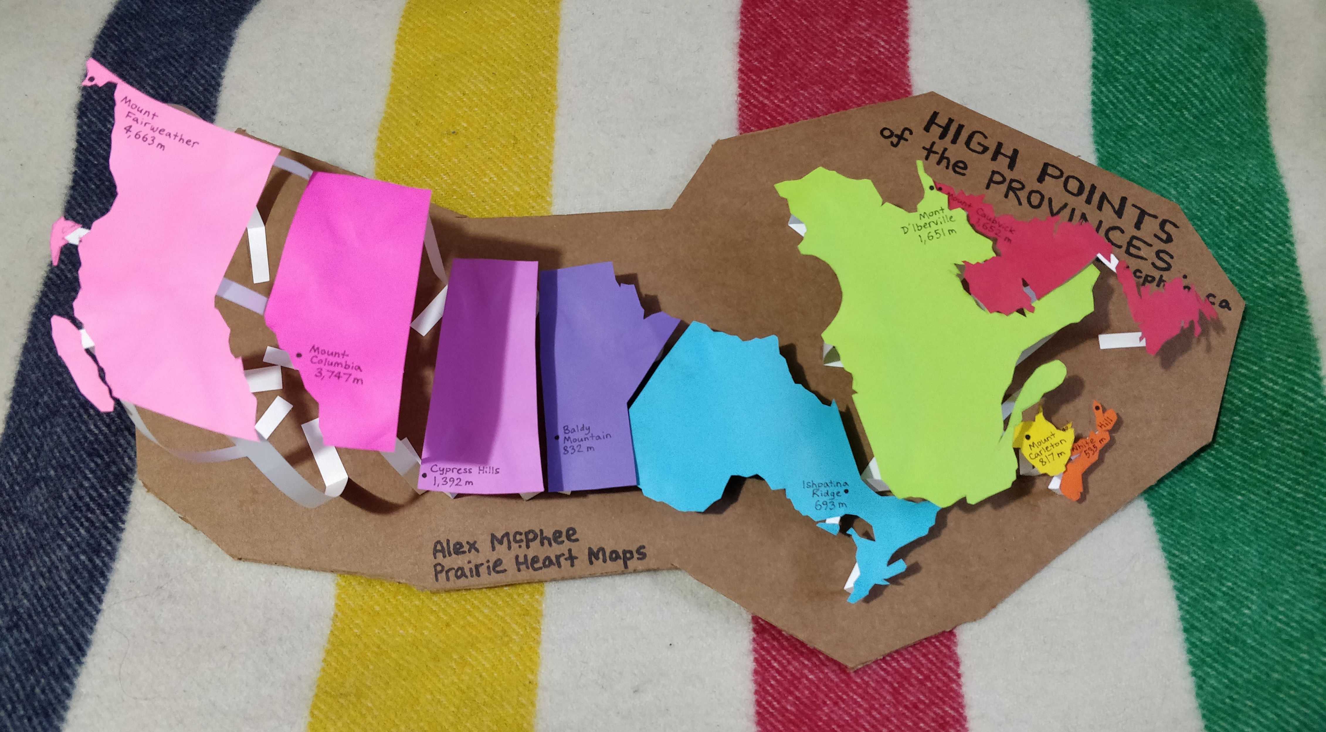 A handmade paper map of the highest point in every province.